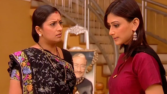 Tulsi Virani stands strong as she faces Maya, who is holding legal papers, with a heartbroken Eklavya crying behind her.